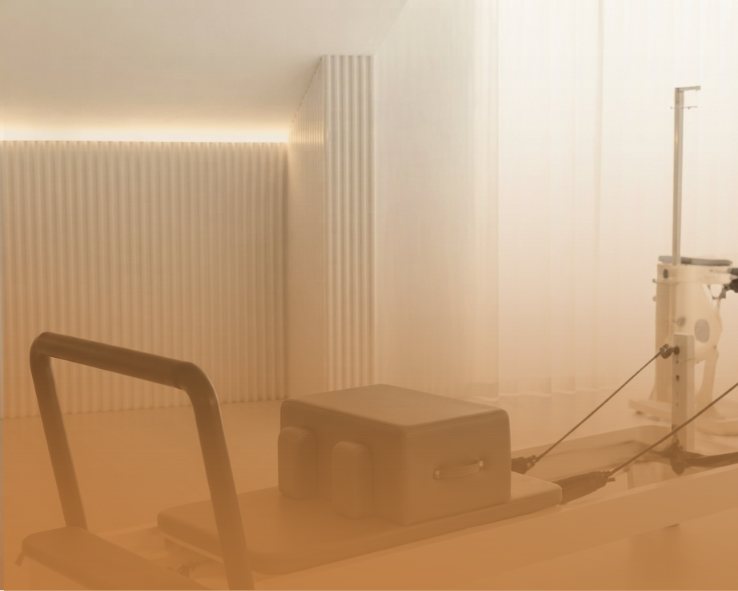 Reformer Pilates equipment in a calm movement space